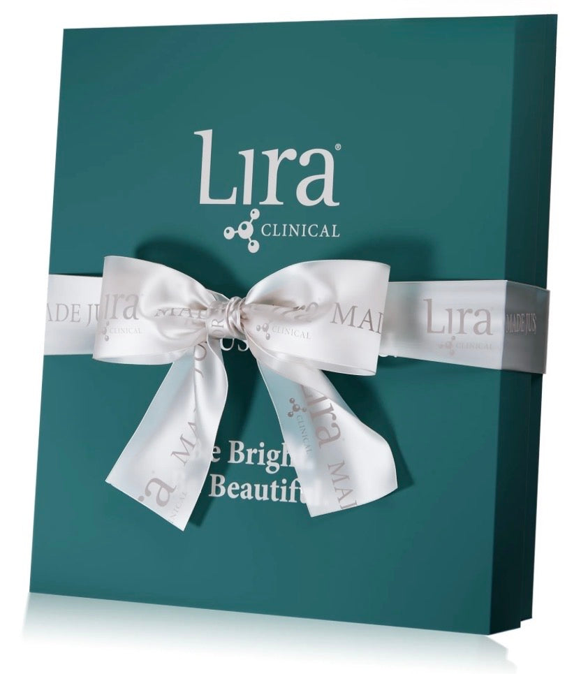 A teal Lira Clinical gift box tied with a white satin ribbon, shown on a clean white background with a soft reflection.